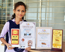 Shreya K H of St Philomena College Bags I Prize in National Level Craft Competition